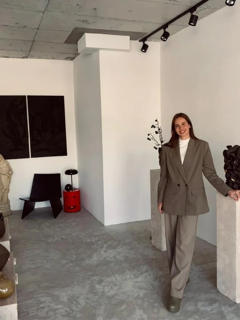Ece Canlı standing in her studio